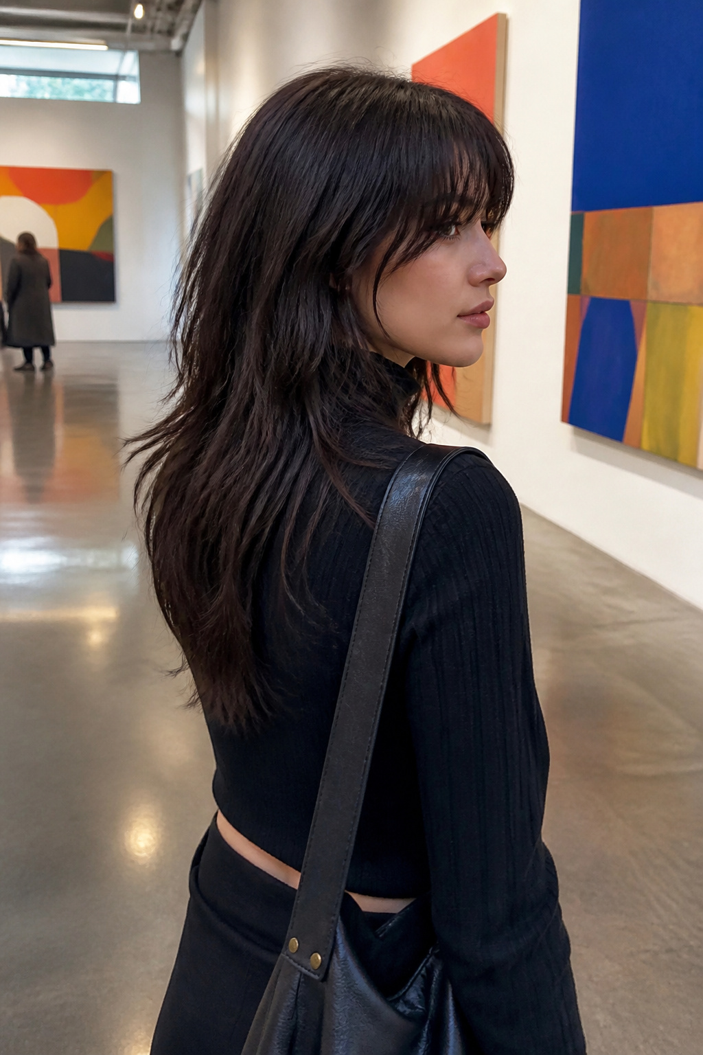 19 Trending Long Layered Hair with Bangs Styles for 2026 5 Model showing long dark choppy layers with sheer bangs.